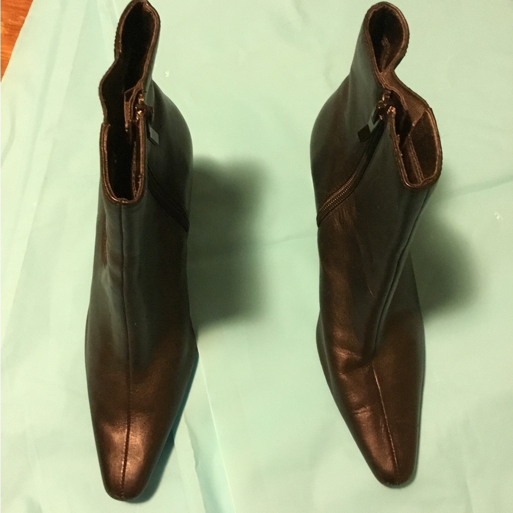 Black ankle leather boots, 6.5, “leather & man made upper,” excellent condition.